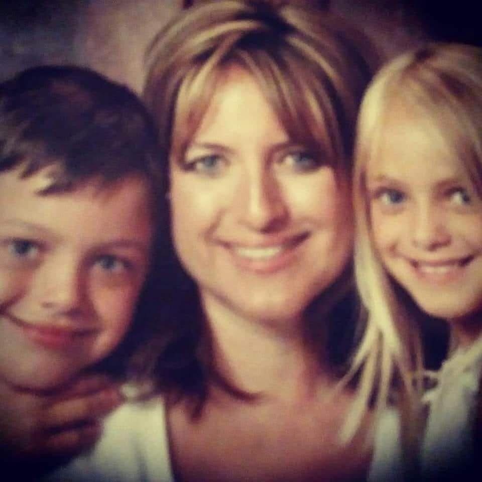 A younger Liz with her two children